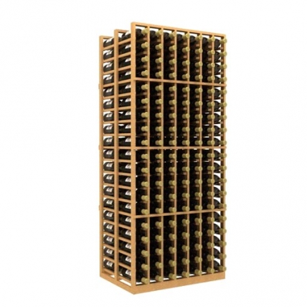 a wooden wine rack filled with bottles of wine on a white background .